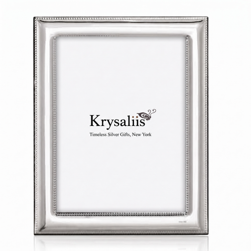 A rectangular silver picture frame with a beaded border, shown empty against a white background. The brand name 'Krysaliis' is printed in the center of the insert.