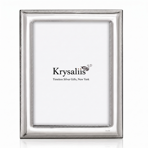 A rectangular silver picture frame with a beaded border, shown empty against a white background. The brand name 'Krysaliis' is printed in the center of the insert.