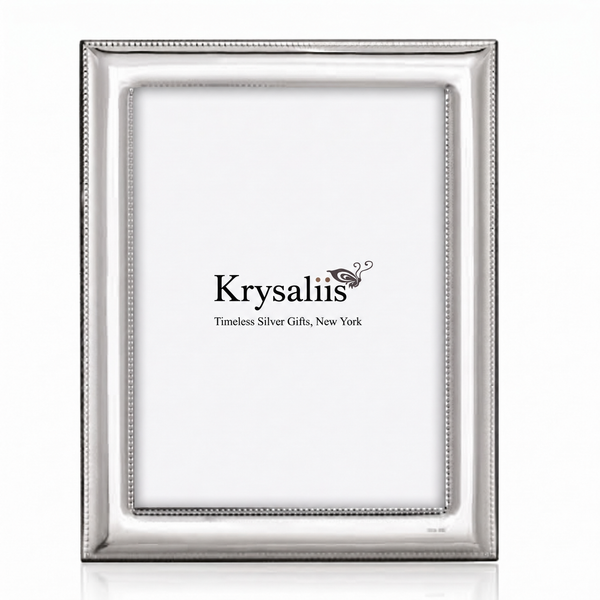 A rectangular silver picture frame with a beaded border, shown empty against a white background. The brand name 'Krysaliis' is printed in the center of the insert.